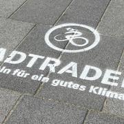 Aufschrift Stadtradeln auf Pflastersteinen
