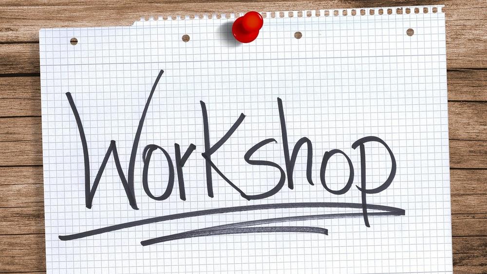 Notizzettel mit der Aufschrift Workshop